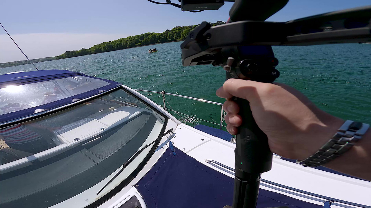 Filming the Menai Raft Run from a luxury boat